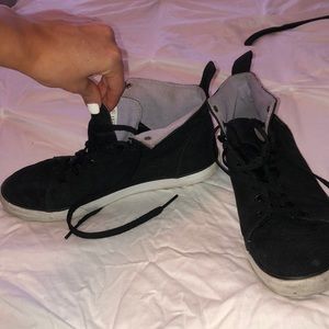 Black high top sneakers